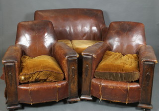 An Art Deco leather covered 3 piece suite comprising 2 seat settee and 2 matching armchairs