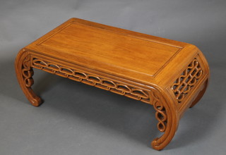 A Chinese carved and pierced hardwood rectangular occasional table 16"h x 37"w x 18"d 