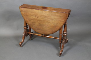A Victorian walnut oval Sutherland table raised on turned supports and with scroll supports to the sides 29"h x 34"w, when closed 6", when opened 41"
