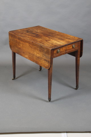 A Georgian mahogany Pembroke table fitted a drawer, raised on square tapering supports brass caps and casters 27"h x 19" when closed, x 39" when opened  