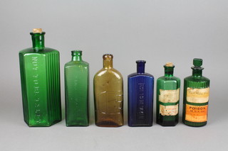 A green glass octagonal poison bottle 10", 5 others