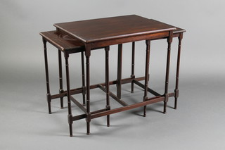 A nest of 3 Edwardian mahogany interfitting tables, raised on turned supports 24"h x 26"w x 19"d 