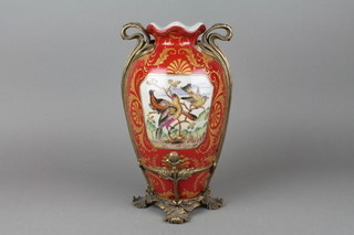 A Victorian style glazed baluster vase of, decorated with panels of birds with gilt metal mounts 13" 