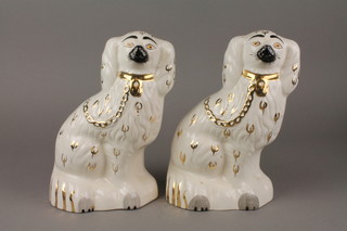 A pair of Beswick Staffordshire style Spaniels with gilt decoration 9" 