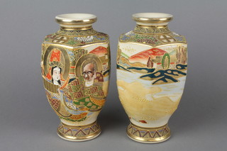 A pair of hexagonal Satsuma baluster vases decorated with figures in landscapes 9"