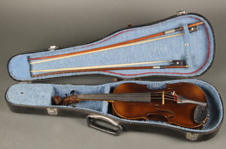 A Rosetti Tati Stradivarius model violin, crack to top, complete with fibre carrying case and 2 bows, 1 marked P H London 