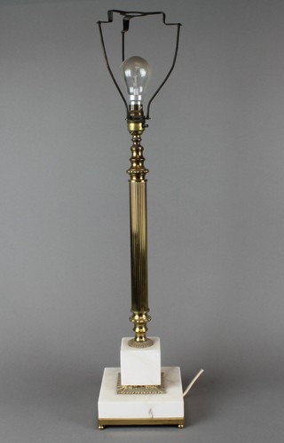 An alabaster and gilt metal table lamp raised on a square stepped base 19" 