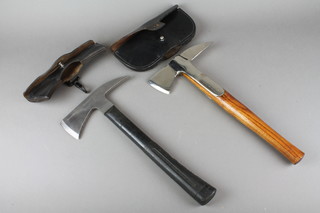 A polished chrome firemans axe with leather frog and 1 other fireman's axe, handle marked The Bristol Axe