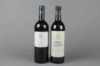 A bottle of 1993 Sarget du Chateau Grand Larose St Julien together with a bottle of 1999 Chateau Camail 