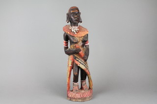 An African carved wooden figure of a standing lady warrior 18" 