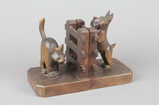 A pair of Art Deco carved wooden bookends in the form of a cat and dog 5" 