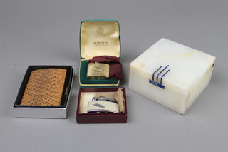 A Betjeman's patent Art Deco marble cigarette box 2"h x 4 1/2"w and a small collection of lighters