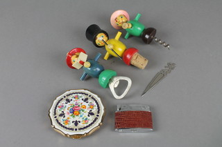 A black and gilt metal compact, a lighter, a metal book mark, a novelty bottle stopper and a bottle opener and corkscrew
