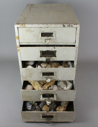 A white metal 5 drawer table top filing chest containing a collection of various fossils 40