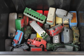 A collection of various toy cars and buses