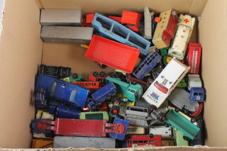 A collection of Matchbox and other toy cars