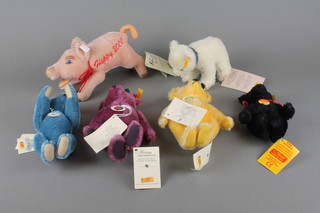 A Steiff 2000 figure of a pig 4", 4 Steiff coloured teddy bears 6" and a Steiff model of a seated bear 5" 
