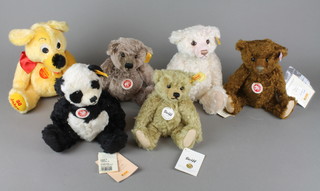 A Steiff 1905 replica yellow bear 9", a Steiff Panda 9", a Steiff gold bear and 3 other Steiff bears  