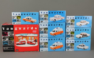 A Vanguard Morris Minor van boxed and 7 Vanguard Police vehicles, boxed