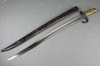 A French chassepot bayonet with brass grip and steel scabbard 