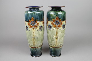 A pair of Royal Doulton oviform vases decorated with a band of stylised formal flowers 18 1/2" (1f)