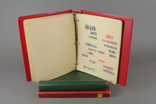 A green loose leaf album of GB stamps and 2 red stock books of World stamps