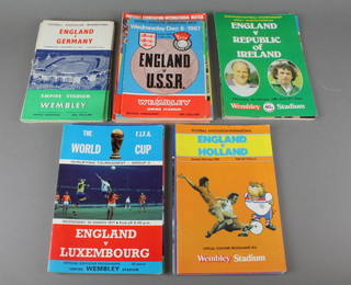 A plastic sleeve of various 1950's and later England International programmes