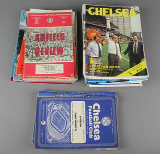 A box of 1950's and later Chelsea football programmes