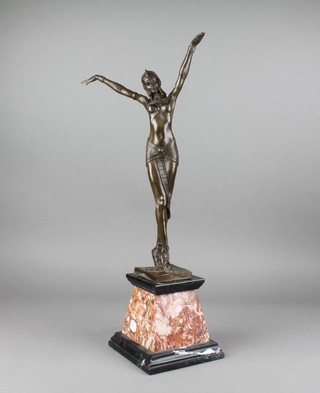 An Art Deco style bronze figure of a standing semi-naked lady, raised on a tapered 2 colour marble base 21 1/2" 