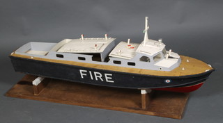 A model fire boat fitted a "compressed air" engine 47" x 15" 
