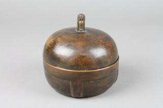 An Art Nouveau circular copper jar and cover, the finial in the form of a seated owl 4" 