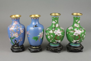 A pair of green ground floral patterned Japanese cloisonne enamelled vases 6" and a pair of blue ground ditto decorated birds 6" 