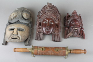 A carved and pierced Burmese wall mask set hardstone eyes 12", 1 other 15", a carved African mask 12" and a 2 piece Indian carved set contained in a hardwood sheath 