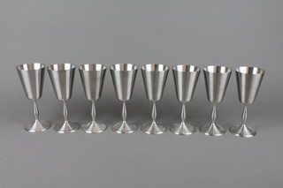 A set of 8 spun aluminium goblets