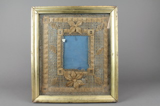 A 19th Century rectangular cut paper panel of geometric design and floral decoration 13" x 11"  