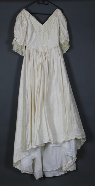 Julie Vernon, a white silk wedding dress, labelled Julie Vernon Haute Couture 