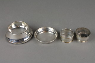 A panelled silver table salt London 1926, ditto napkin ring Birmingham 1963, a silver table salt Sheffield 1949 and a small silver dish 