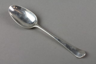 A Georgian silver table spoon with chased armorial, London 1766, 82 grams