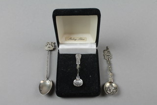 A miniature silver mustard spoon with shell bowl and 2 others 