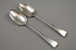 2 Georgian Old English style silver serving spoons, approx. 112 grams