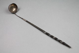 A Georgian silver toddy ladle with whale bone handle 15" 