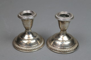 A pair of Sterling silver dwarf candlesticks 3 1/4"
