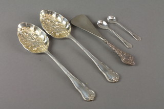 A pair of silver plated berry spoons, a button hook and 2 spoons
