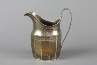 A George III silver helmet cream jug with simple chased decoration, approx 122 grams