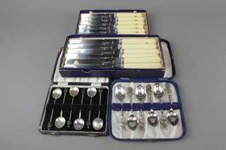 A set of 6 silver bean end coffee spoons, Birmingham 1944 and 3 other cased sets