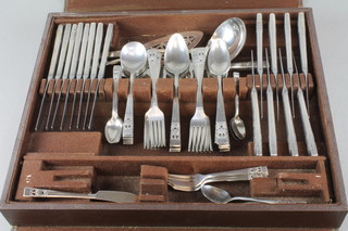 A canteen of silver plated cutlery for 7 with pierced handles