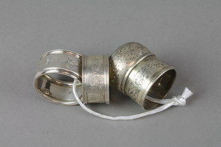 4 early 20th Century chased silver napkin rings approx 54 grams