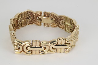 A 9ct gold fancy flat link bracelet, approx 48 grams