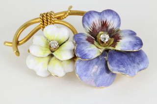 A yellow gold enamel and diamond pansy brooch