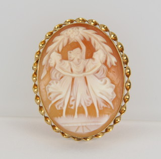 A 9ct gold cameo brooch depicting The Three Graces in a rope twist mount